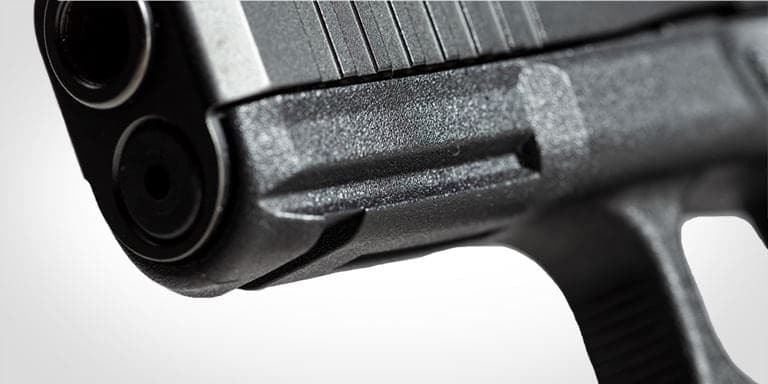 Close view of the G45 accessory mounting rail ahead of the trigger guard