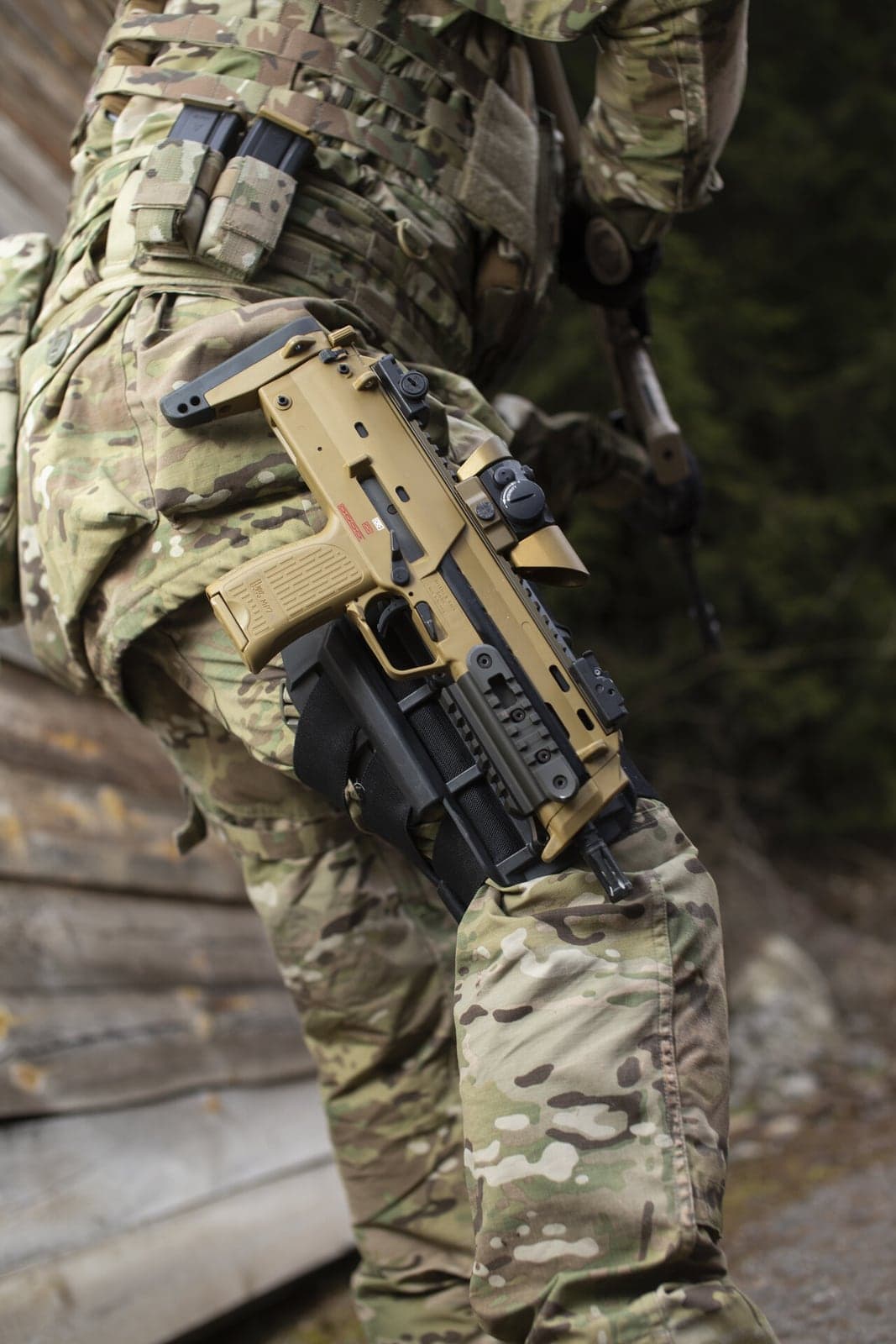 MP7 carried in the Heckler & Koch multi-functional holster on a soldier's hip