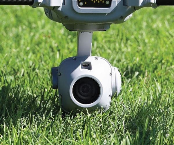 ION 30X MK2 daylight camera payload under the Indago 4, resting on grass