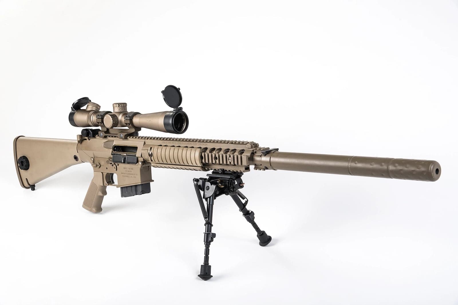 Coyote-tan M110 with riflescope, bipod and suppressor on a white background