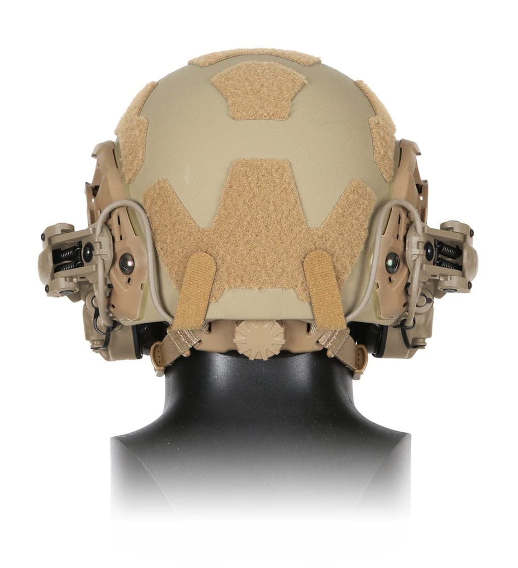 Tan headset mounted on the rails of a tan helmet, seen from behind