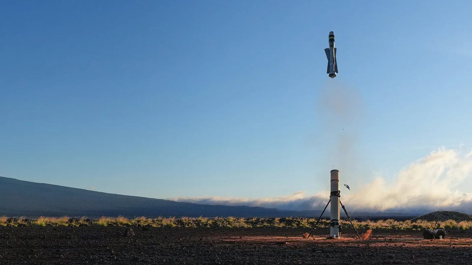 Switchblade 600 launching from its tube on open ground at dawn