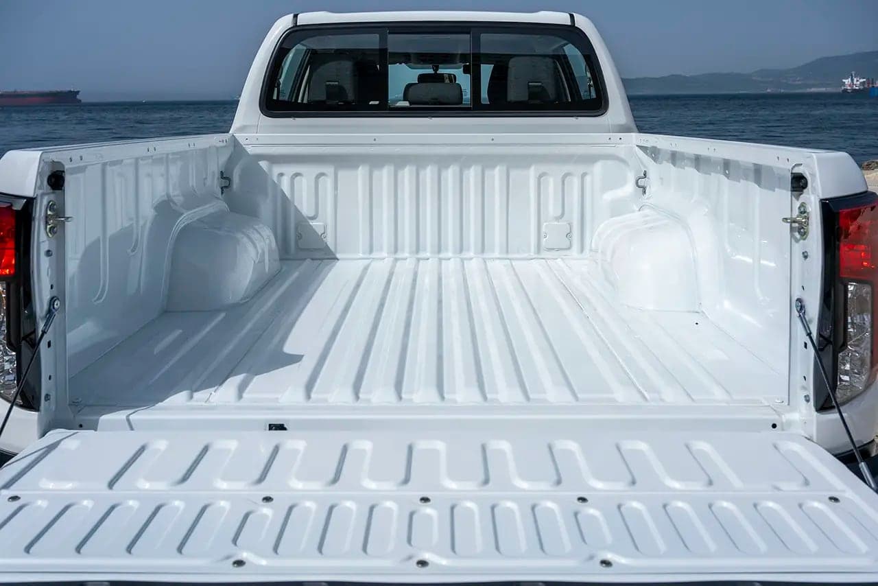 Hilux cargo bed seen from behind with the tailgate open